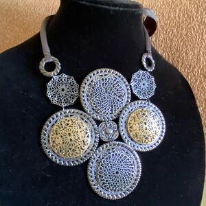 Grey, gold and silver metal medallion necklace